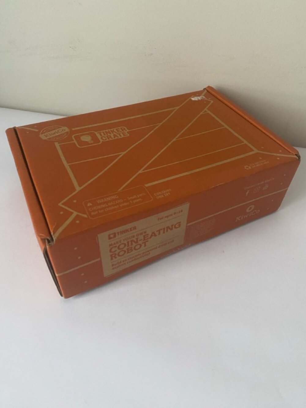 KiwiCo Coin-Eating Robot Tinker Crate build kit. Recommended ages 9+.